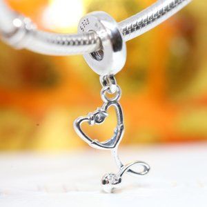 PANDORA STETHOSCOPE HEART DANGLE CHARM 799072C01